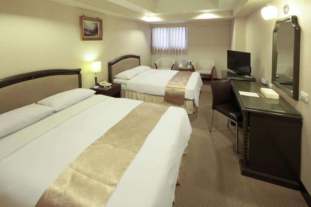 Lincoln Hotel Тайнань Номер фото