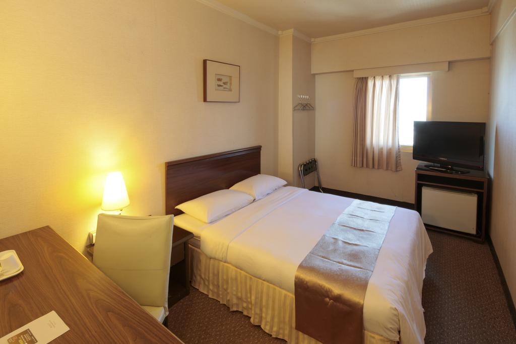 Lincoln Hotel Тайнань Номер фото